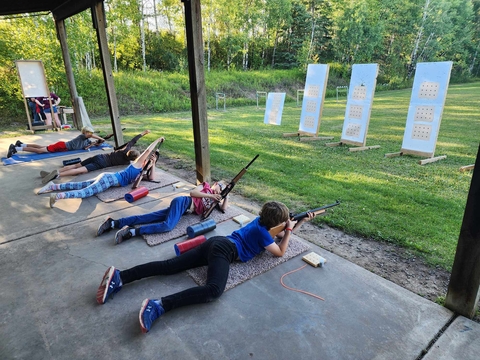 youth practicing firearm safety