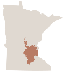 Map of Minnesota in gray with the greater Twin Cities metro area colored in brown.