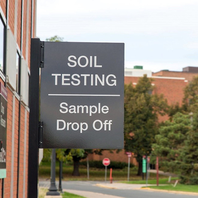 Sign outside of a University of Minnesota building that says Soil Testing